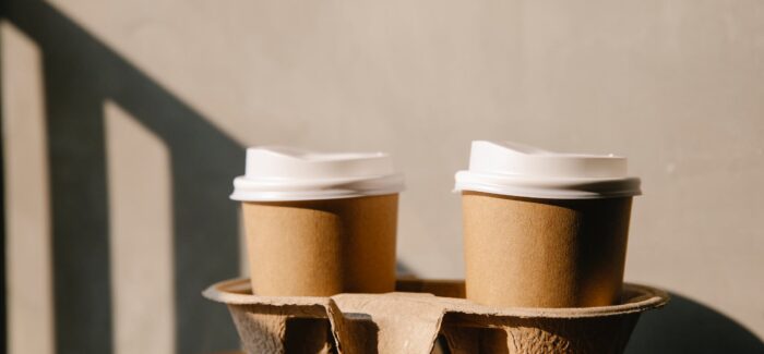 Two coffee cups on a table