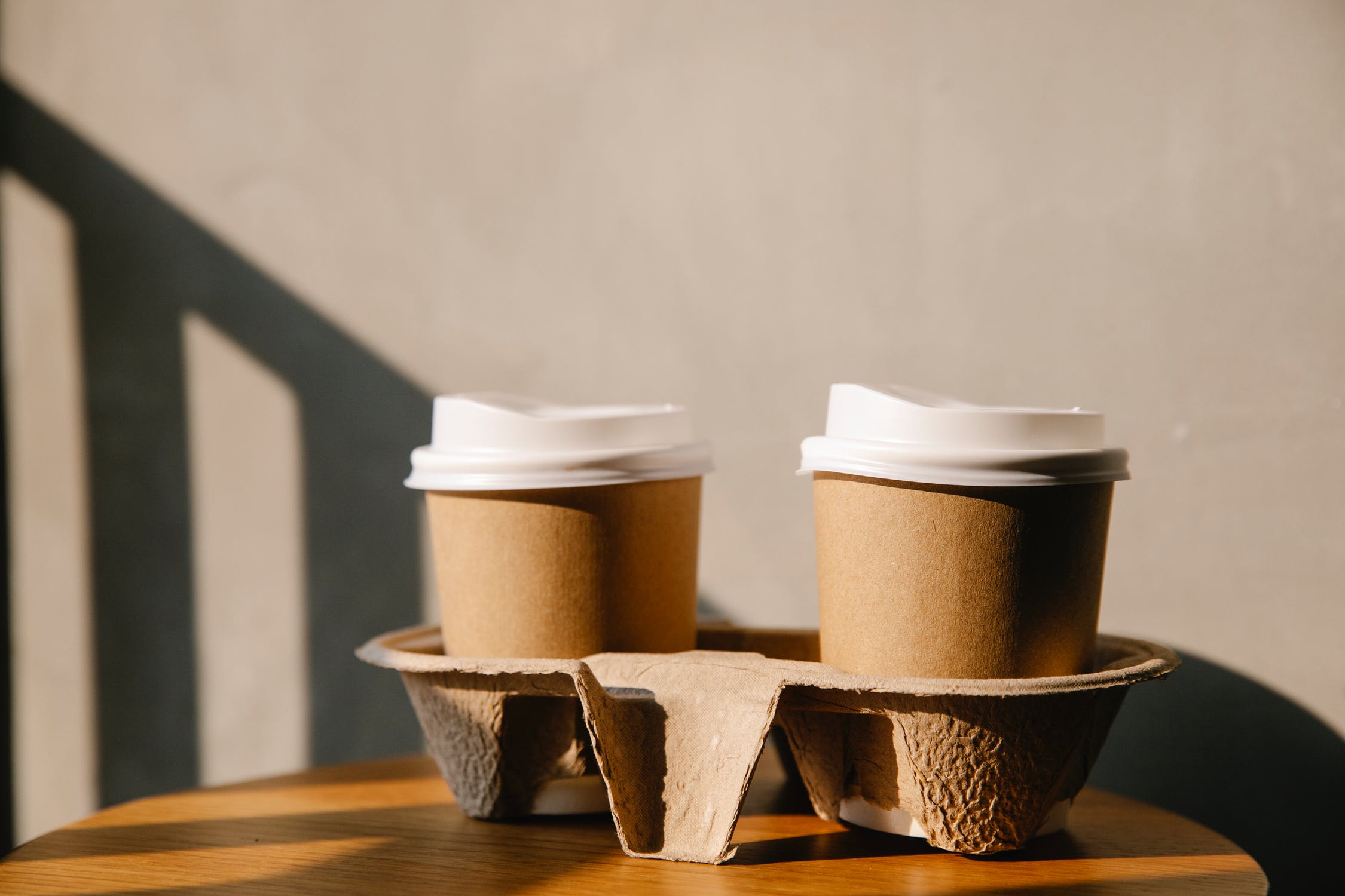 Two coffee cups on a table