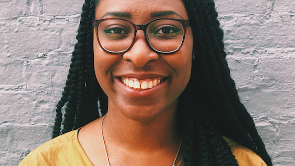 A profile picture of Yinka N. Bode-George (a woman with hair falling on her shoulders and wearing glasses)
