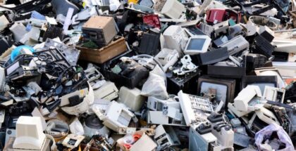 Image shows a large collection of different types of e-waste